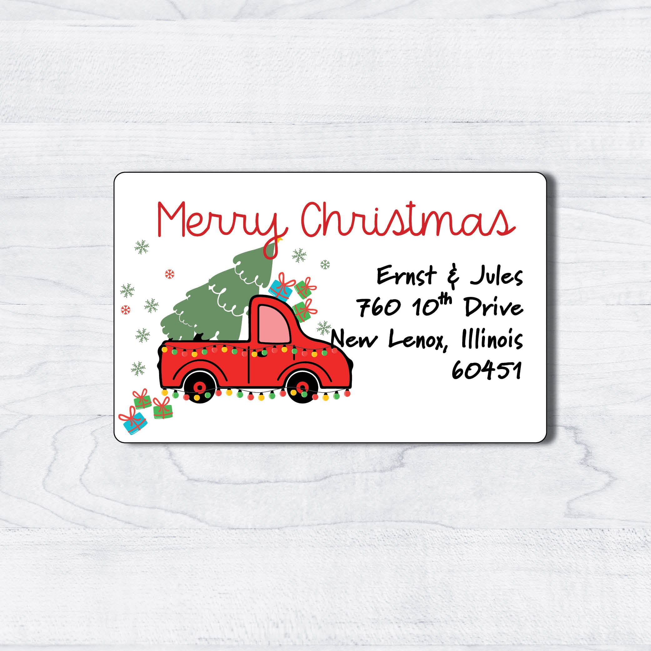 red truck cartoon christmas return address labels with holiday lights and christmas tree, presents