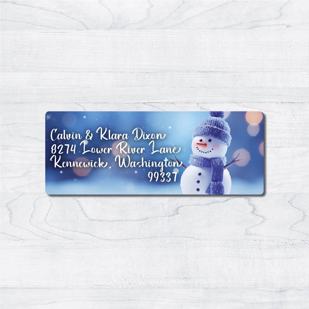 snowman return address labels for christmas winter blue background