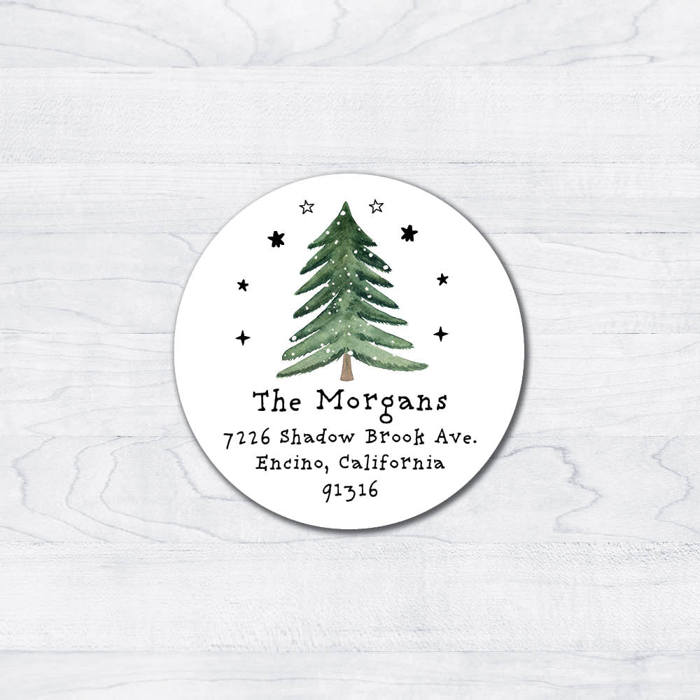 starry round christmas tree with snow return address labels with modern font on circles