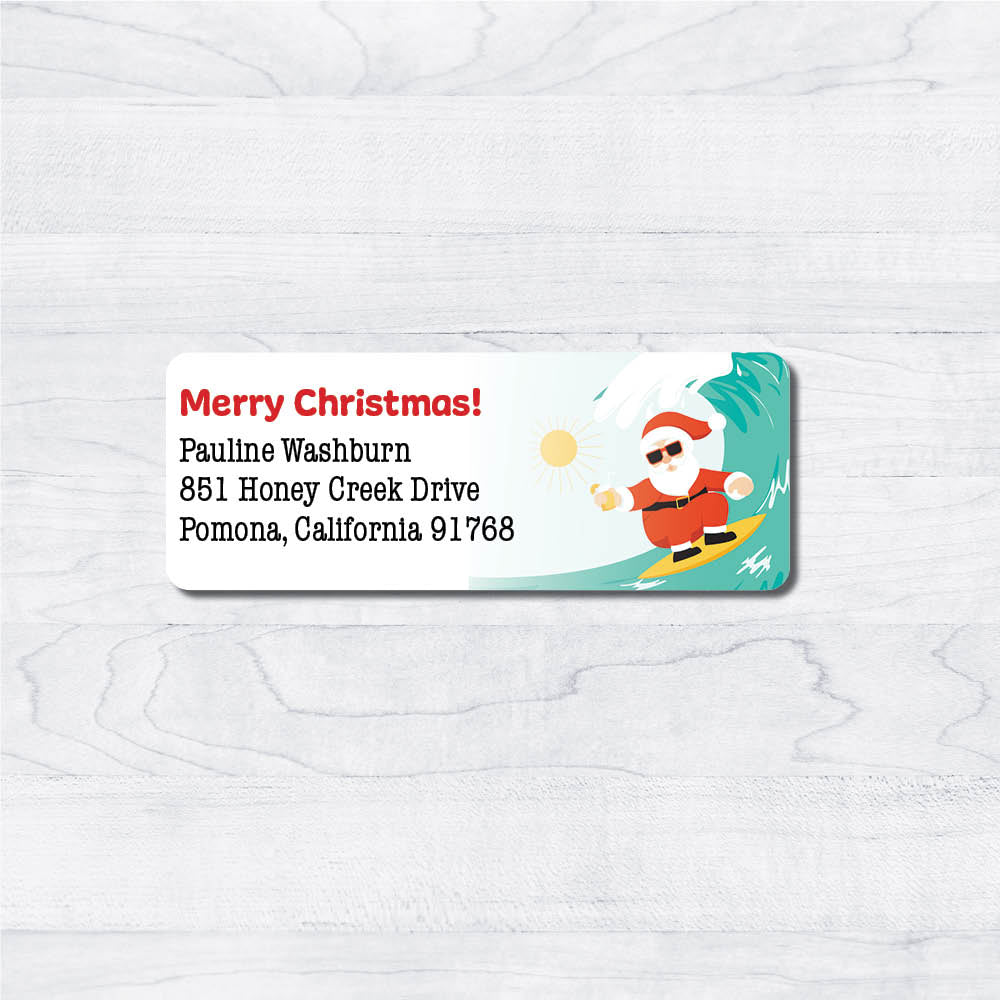 Surfing Santa Claus on the waves Christmas Return Address Labels.
