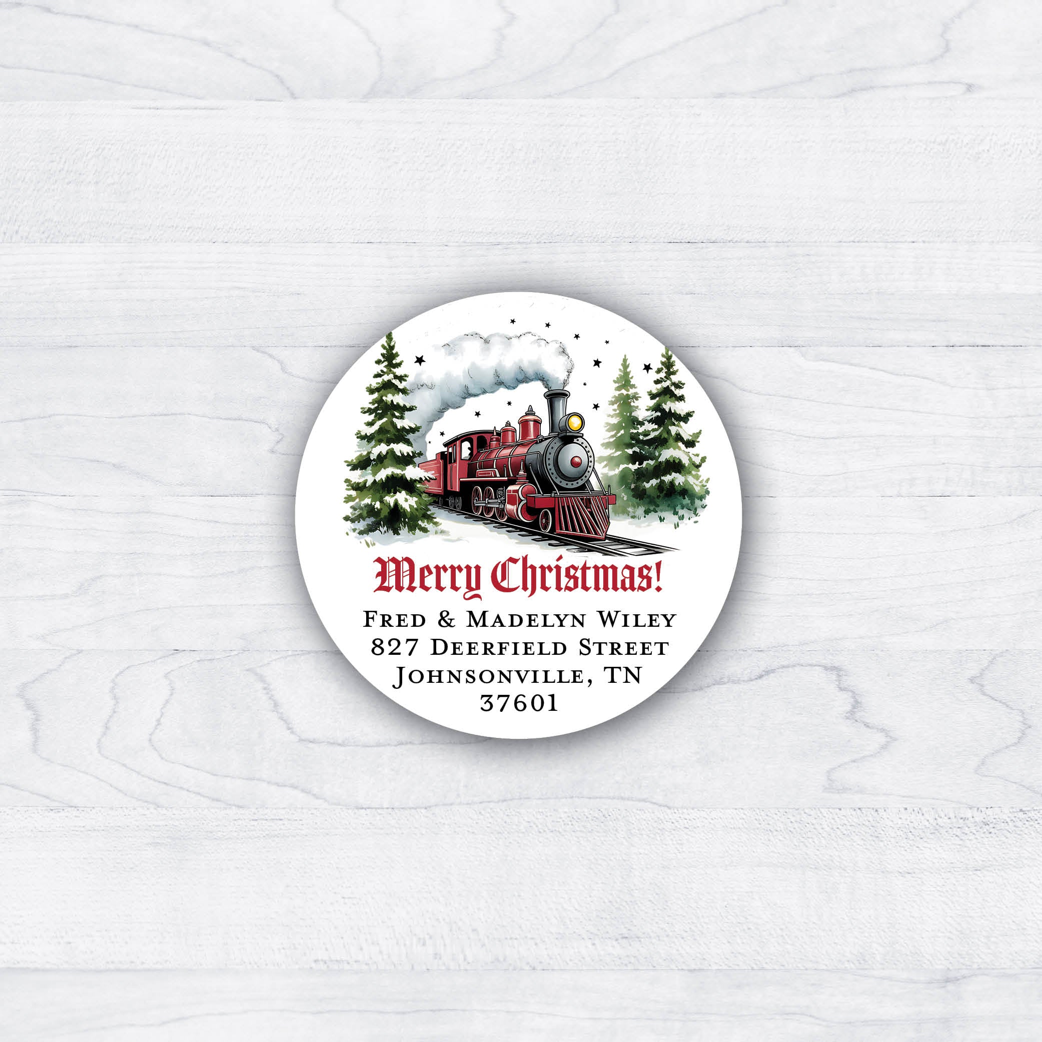 Christmas train round return address labels with snow covered trees and stars