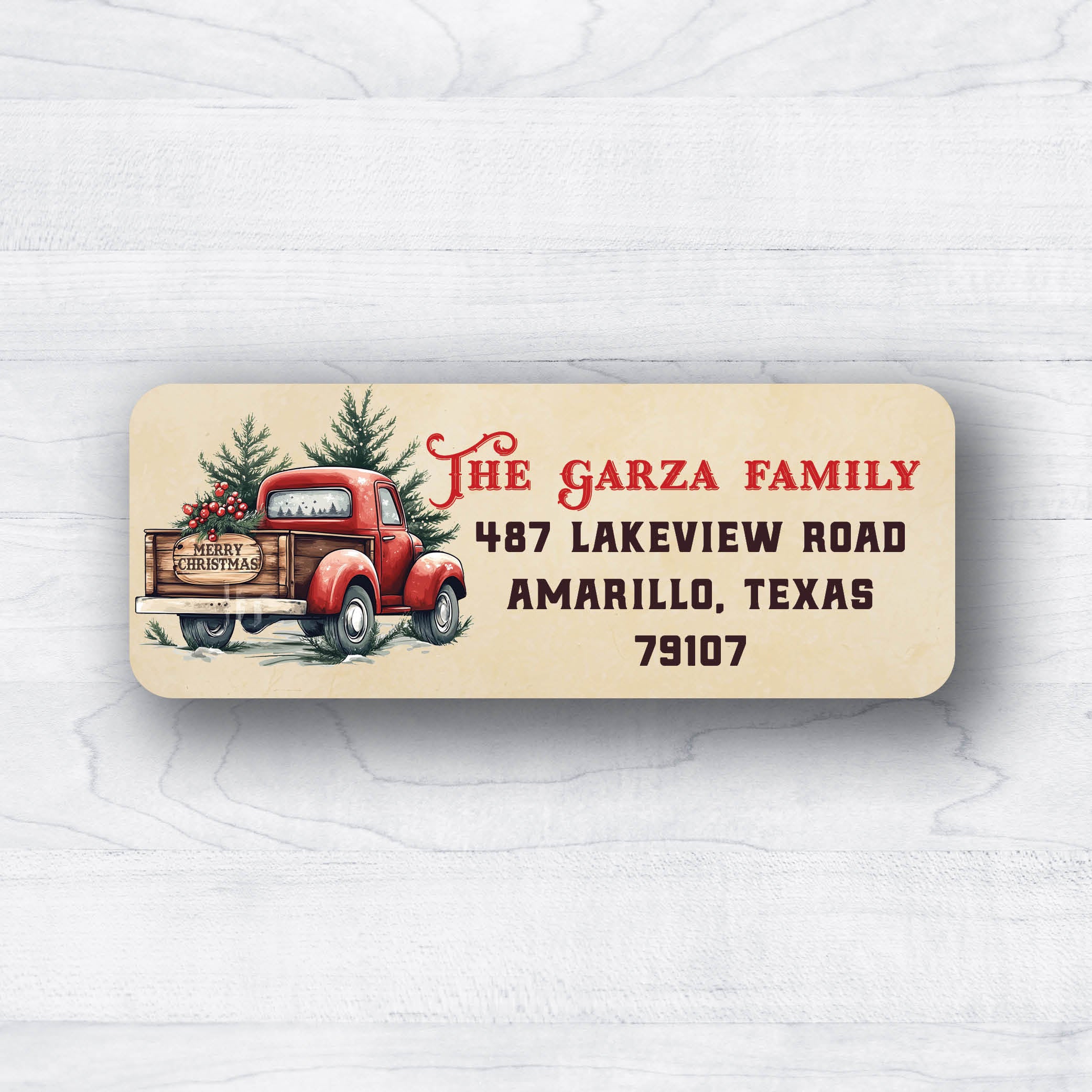 Antique red truck with holly for Christmas return address labels and western background and font