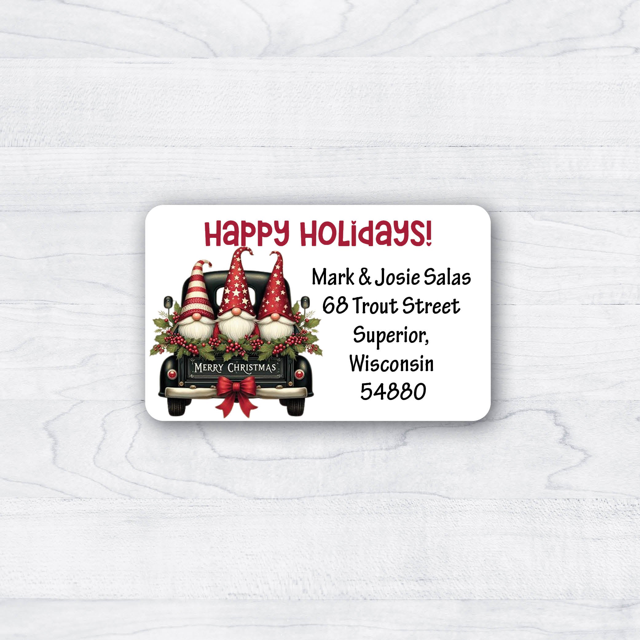 3 christmas gnomes on the back of an old black pickup truck return address labels