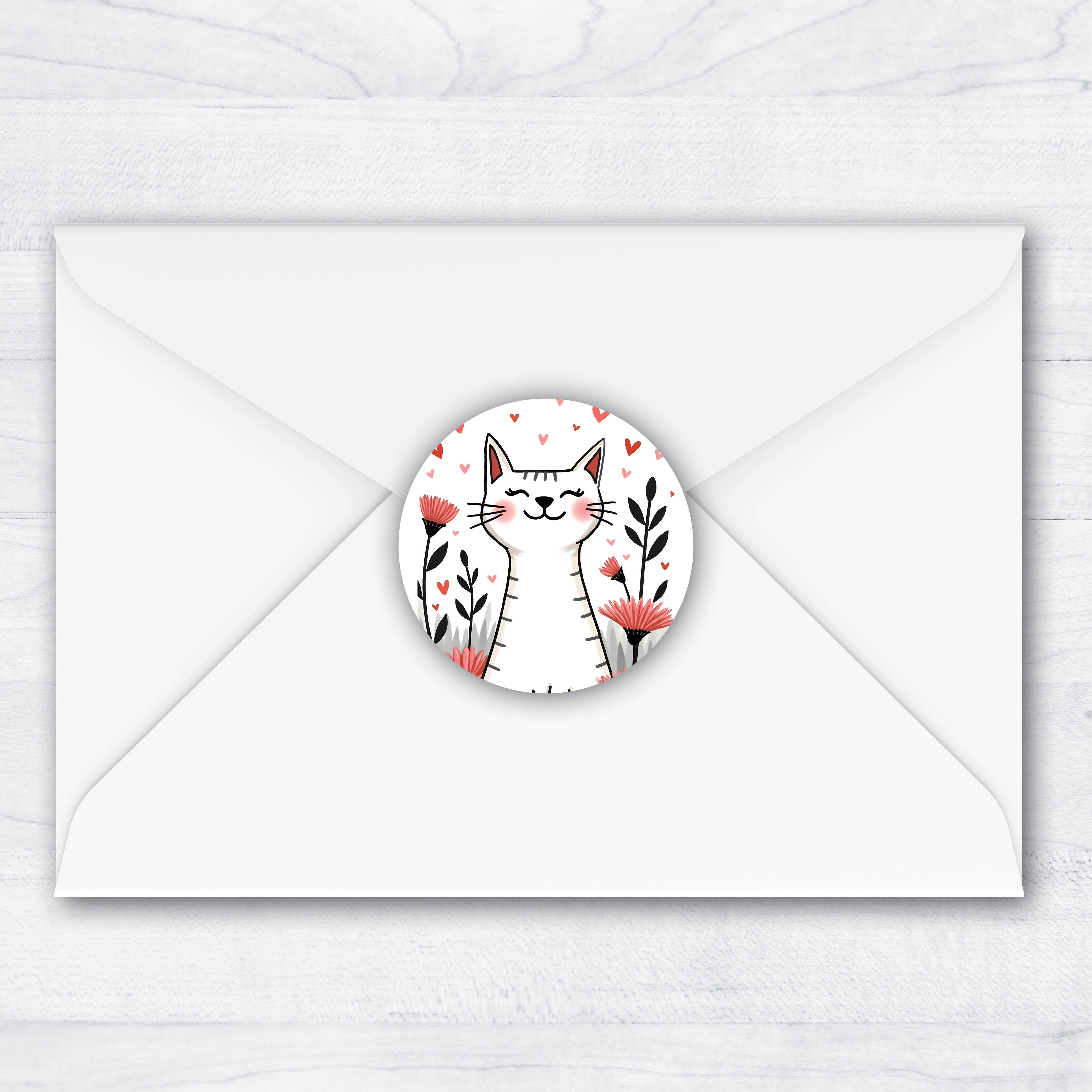 envelope seals with a smiling cat surrounded by hearts and pink flowers