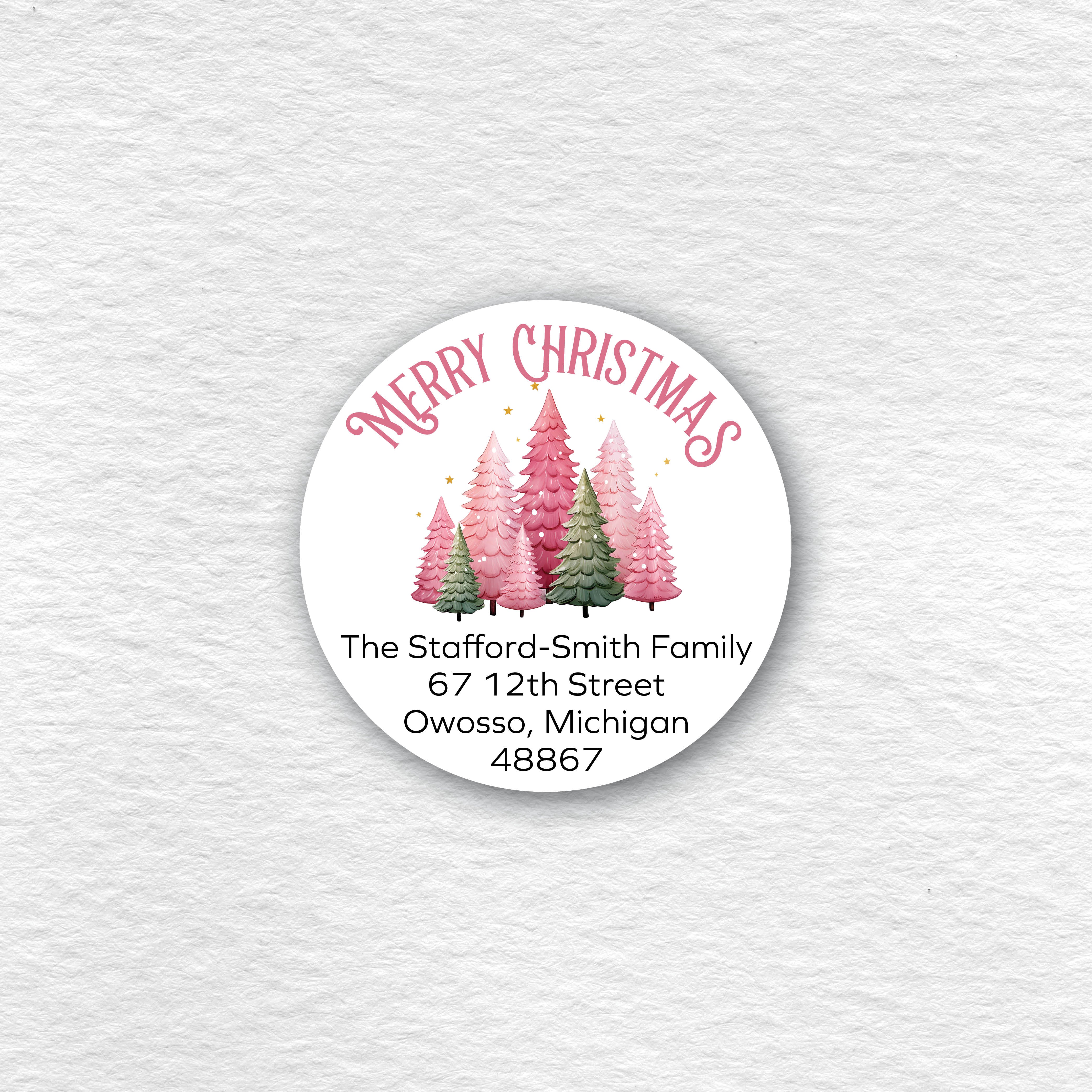 A circular Christmas label on the featuring pink and green Christmas trees.