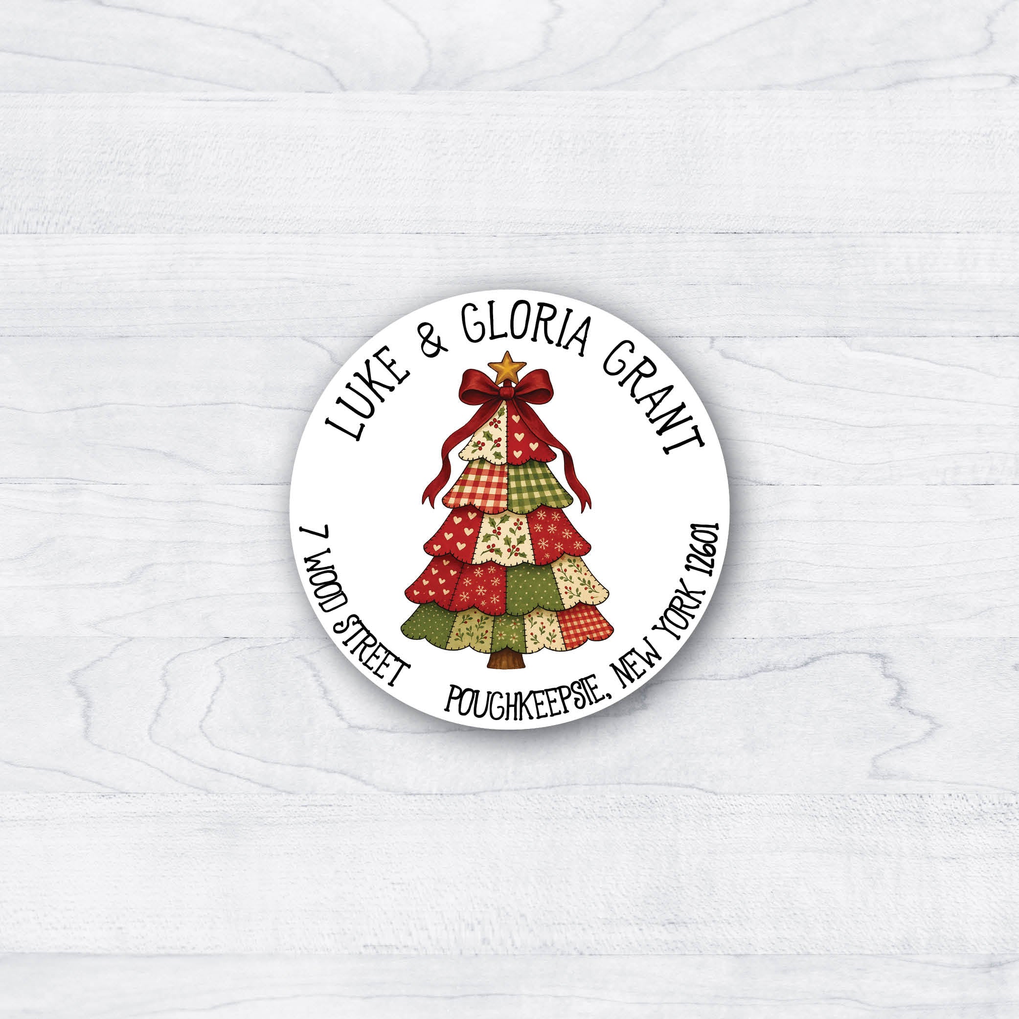 Brightly colored Christmas labels with a quilted Christmas tree with a bow and a star on top.