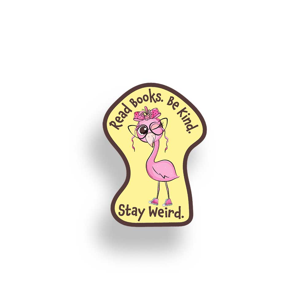 A die-cut sticker featuring a pink flamingo wearing sunglasses and a pink ribbon on a pale yellow background, with the text 'Read Books. Be Kind. Stay Weird."