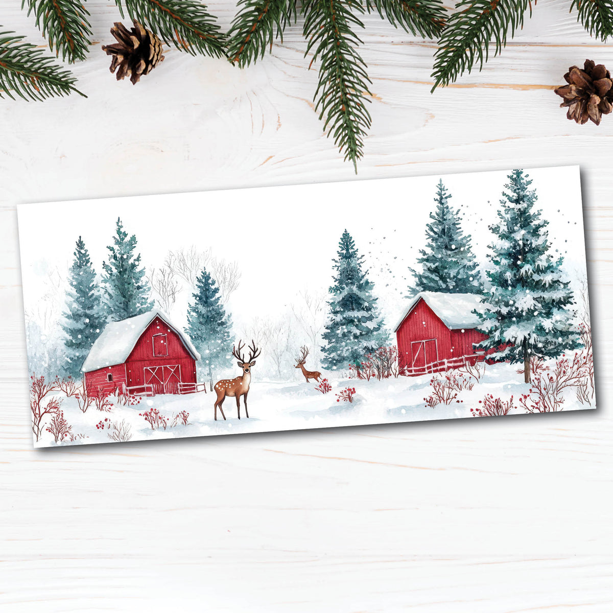 the front of the card  features a rustic red barn nestled among snow-covered evergreens, with two deer standing quietly in the snowy foreground. 